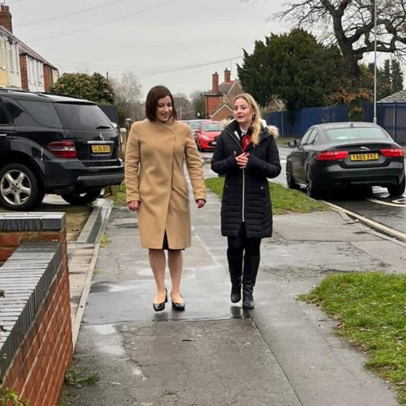 Shadow Education Secretary Bridget Phillipson MP with Wellingborough Labour candidate Gen Kitchen, walking down a street in Wellingborough together, December 2023