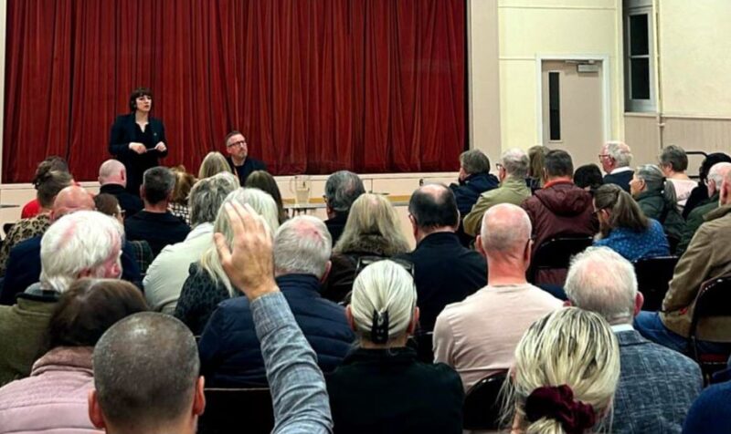 Bridget (left) and residents at her community meeting in Newbottle